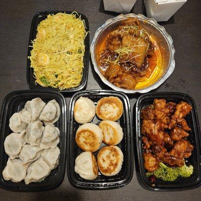 Singaporean noodles Orange pork Pork and chive dumplings Pan fried buns General tsos chicken