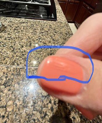 Huge bump on the thumb that I noticed when I walked out of the salon