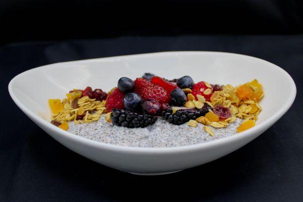 Chia pudding with granola and berries.