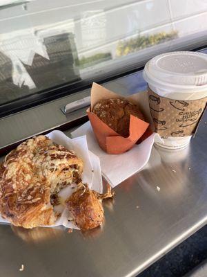 The savory onion bacon croissant, and blueberry muffin with a hot apple cider