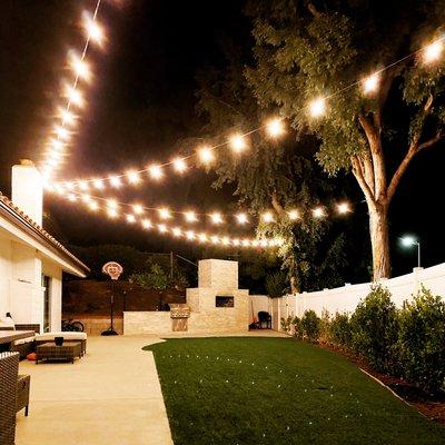 Backyard custom string lights installation