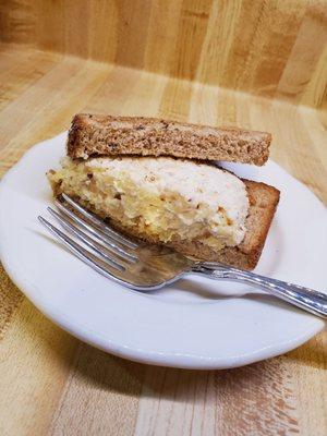 Tiny chicken salad sandwich on MULTIGRAIN wheat bread. Trashed the other 2 half slices before I remembered to snap a pic