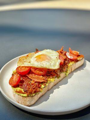 SMOKED AVOCADO TOAST - with extra bacon, cherry, tomato, smoked paprika, lemon zest, chives *added a fried egg