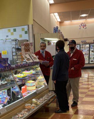 I reported this incident & the store mgr and assistant mgr for holding their face masks away from their faces as they talked to each other.