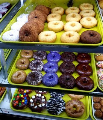 Mixed donuts bottom are topped with MM's and  Oreo Cookies