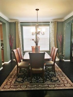 This beautiful rug works perfectly with our formal dining room. We are in love with this silk and wool, hand tufted rug!