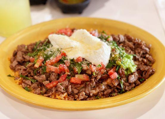 Carne asada burrito bowl (order "without tortilla").