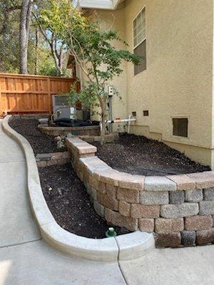 Concrete pathway and retaining walls