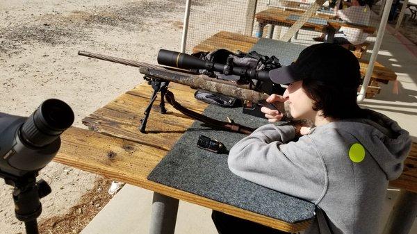 Young ones learning the basics of marksmanship