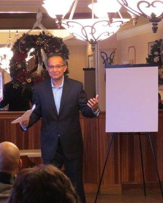 Salim hosting his monthly networking breakfast at the Middletown Pancake House.