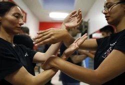 Some Chi Sao (sticky hands) action to build reaction time and reflexes. Chi Sao is the basis for Wing Chun for building the sensitivity.