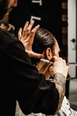 We finish off each haircut with a straight razor clean up on the back of your neck.