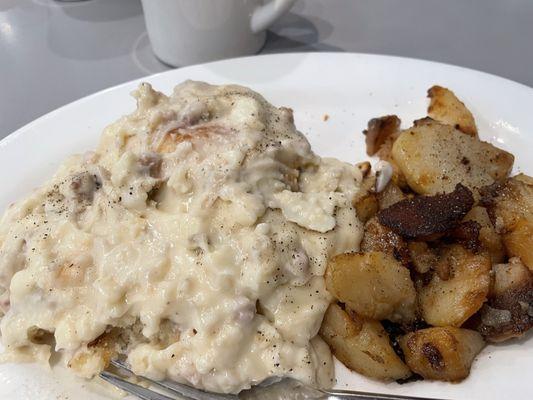 Sausage gravy with one biscuit.....Couldn't eat it all!