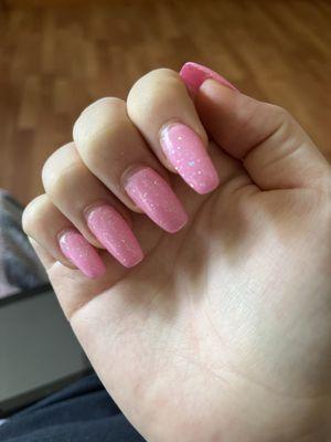 Nails in pink with glitter