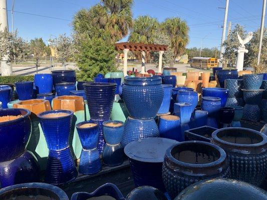 Small snippet of the wide selection of blue glazed ceramic pottery at Artistic Statuary.