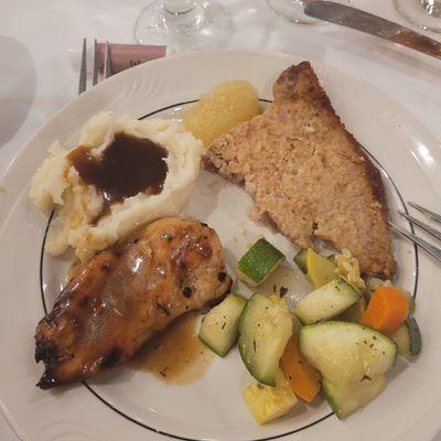 Mashed potatoes, apple sauce, pork chop, roasted veg n grilled chicken served family style