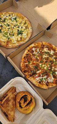 Butter Chicken Pizza and Chettinadu Paneer Pizza with a chicken pastry, not sure what the other pastry is