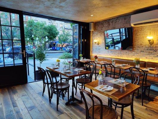 Beautiful interior with fresh flowers at every table