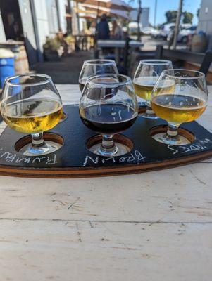 Beer flight.  Great beer, Great service. Dog friendly. A must try