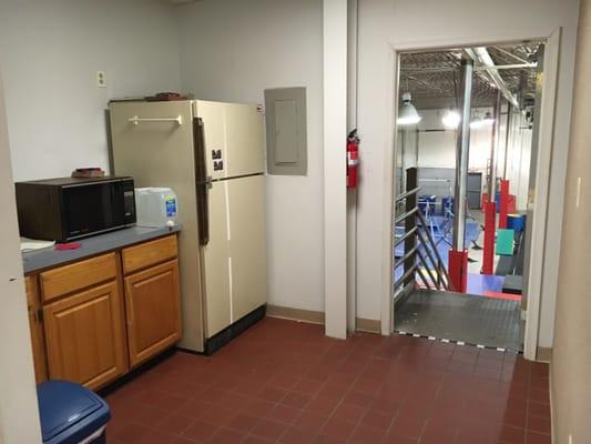 Kitchenette and entrance to the lower gym area.