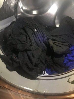 This is showing the clothes soaking wet after the wash cycle