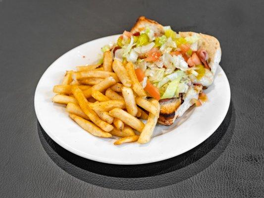 Italian meats, cheese, pepperoncini's, shredded lettuce, tomato, Italian dressing served on a French roll