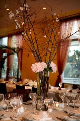 Table centerpieces with blooming branches