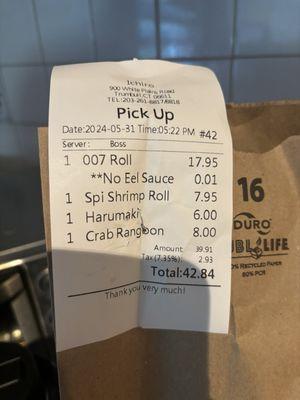 Receipt with the .01 cent charge for no eel sauce ‍