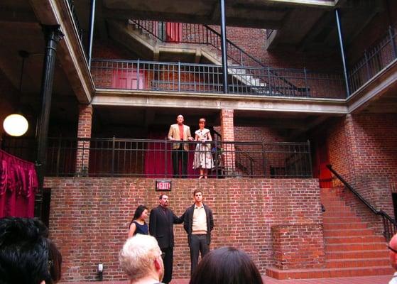 The king and queen smile down at Ophelia, Polonius, and Laertes  (Hamlet, Aug. '12)