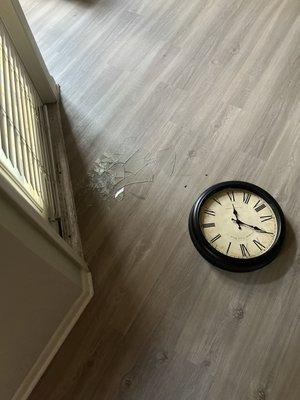 My clock that fell off the wall and shattered due to aggressive roofers.