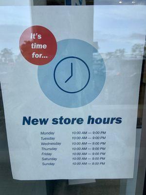 Store Hours posted in window