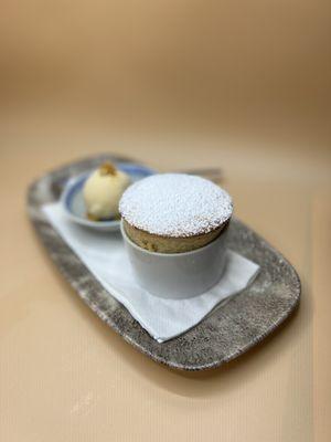 Mango soufflé with house made cardamom and rose water ice cream.