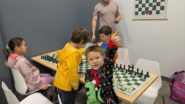 Kids enjoying a fun and engaging chess class with Silicon Valley Chess Kids in Palo Alto, learning strategies while making friends!