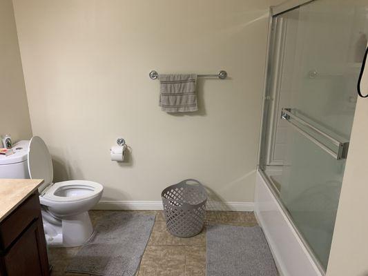 Bathroom space is big, clean, gorgeously lit, luxurious.