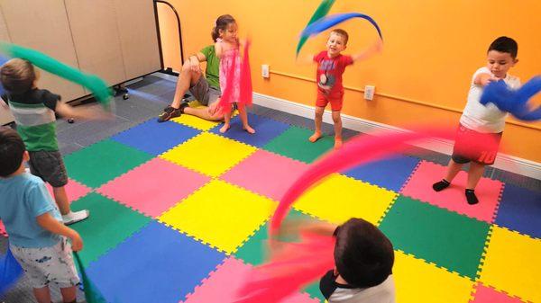 Preschoolers with a joyful scarf dance!