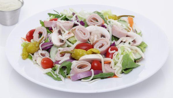 CHEF SALAD - Iceberg & romaine mix with tomatoes, mushrooms, red onions, cucumber, pepperoncini peppers, ham, turkey & mozzar...