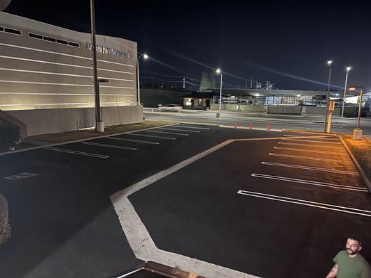 Asphalt driveway pavement with striping