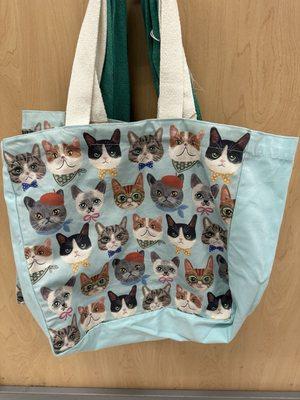 A bag with cats!! Adorable.