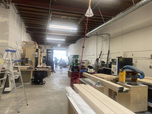 Large cabinet shop with state of the art equipment for custom cabinet work.