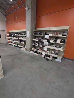 Footwear in the rear of the store