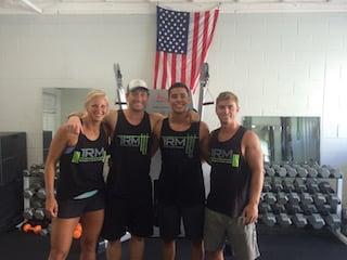 Trainers Bobby Congalton, Melissa Hinkley, and Blake Koehn with Dylan on his last day before leaving for his season of D1 baseball