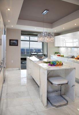 High gloss Pedini cabinets. White Statuary marble. NYC view...