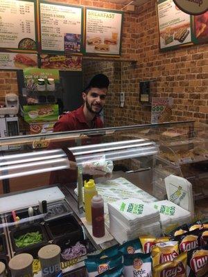 This is Thaer making a sandwich at Totem Lake Subway.