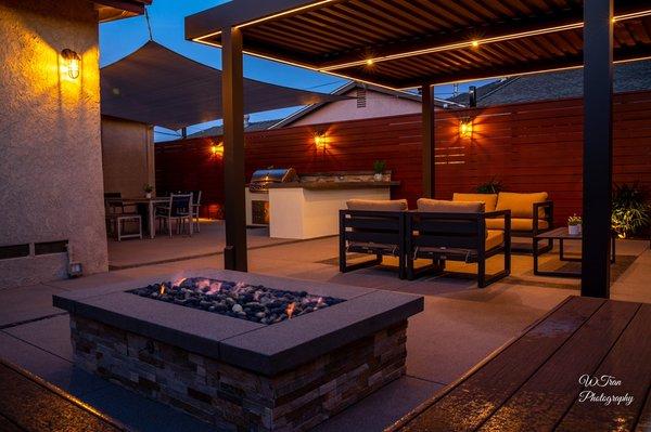 The lighting effects really add a welcome inviting atmosphere for a well-invested outdoor living space.