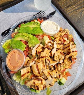 Cobb Salad topped with grilled chicken breast