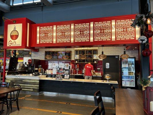 Gu's Dumplings stall.