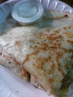 Chicken quesadilla is very flavorful! Comes with side of sour cream.