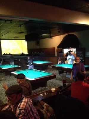 Dart room in back with 5 boards. 20 8' tables in front with nice felt