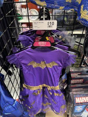 Batgirl dress marked at $10 and 50% off sign not pictured.