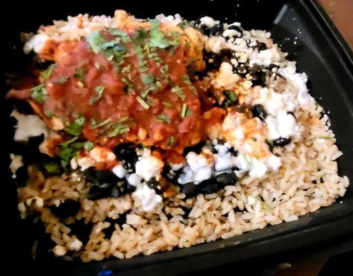 Enlightened menu chicken with brown rice, black beans, feta, and a Greek Yogurt sauce.